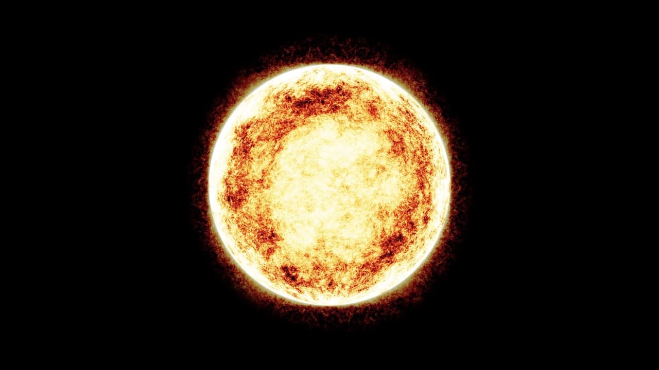 Soft lens flares of warm light drifting slowly across a bright field