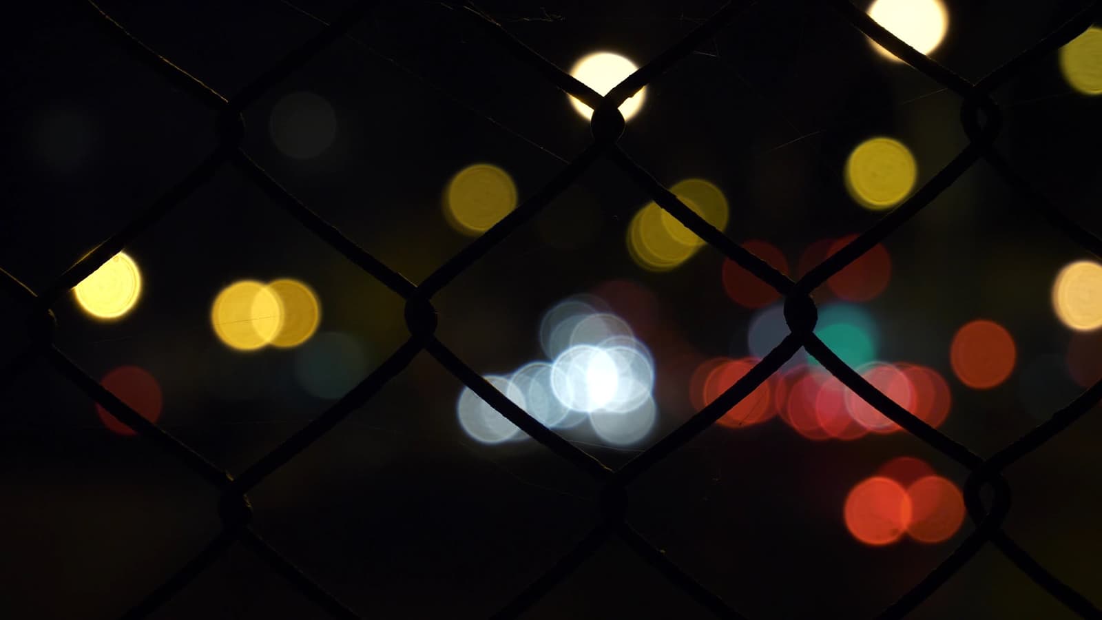City lights blurred into soft warm circles of bokeh at night